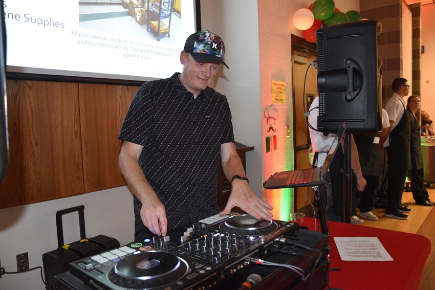 DJ Mark Franzen spinning the 1950s music. He was a 2000 Fort Lupton graduate.